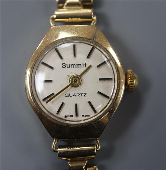 A ladys 9ct gold Summit wristwatch on flexible link bracelet, gross 13.2 grams.